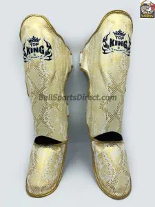 Golden and white Pro Muay Thai shin pads Top King super snake Front of Pro Muay Thai shin pads Top King super snake